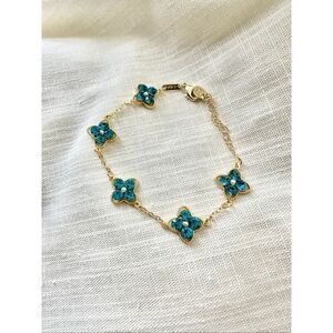 Bright blue four leaf flower chain-link bracelet